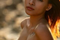 Thai beauty Oopeve picks a secluded spot on the beach